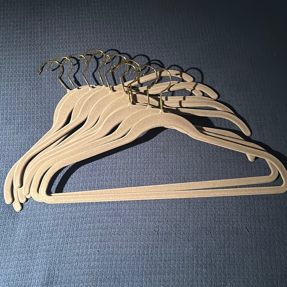 20 grey Joy Mangano Huggable Hangers w/goldtone hooks.